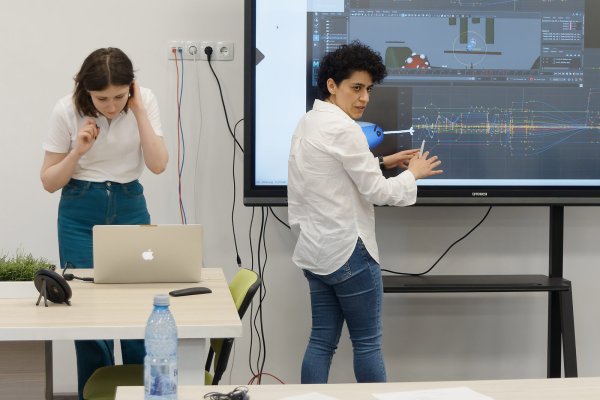 Cristina Teaching Art in class